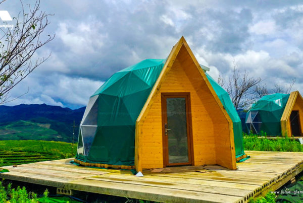 Glamping dome tent with A-frame cabin look door
