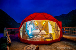 Red Glamping Domes in the Night