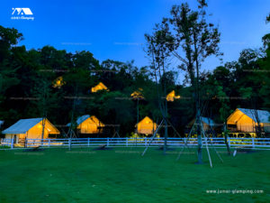 Safari Tents on the platform in the woods at dusk